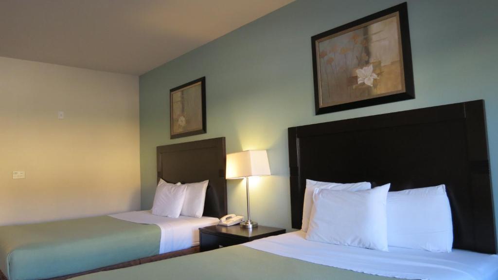 Grand Inn And Suites Houston Habitación foto